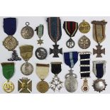 A selection of Victorian and later medals and badges and civilian medals,