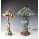 A Tiffany style glass lamp and shade, decorated with flowers, 54cm, with a Studio glass lamp,