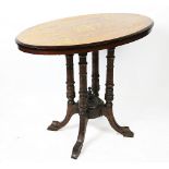 A Victorian inlaid walnut oval occasional table, with turned and carved legs,