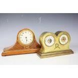 An Edwardian brass combination time piece and barometer, with presentation engraving to base,