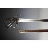 An 1821 pattern officers saber; with an Irish Guards swagger stick with number 2717279,