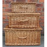 A graduated set of three wicker coaching baskets,