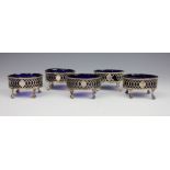 A set of four silver salts,