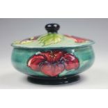 A Moorcroft Hibiscus pattern bowl and cover,