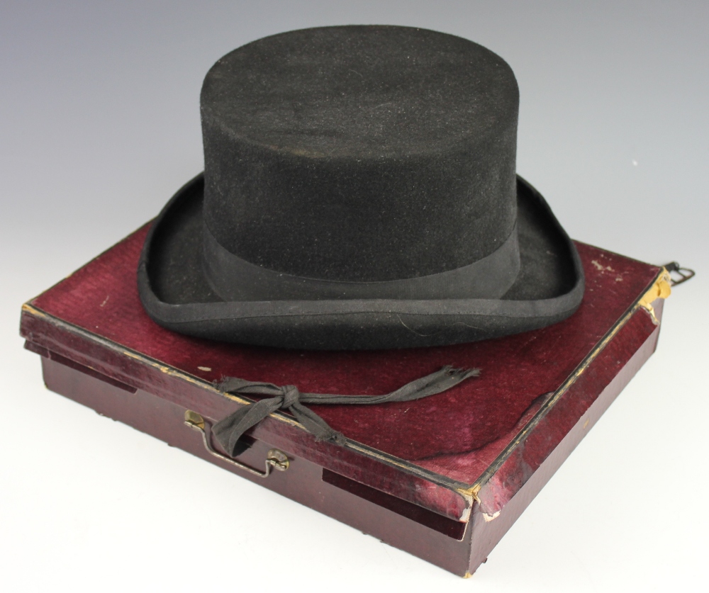 A felt top hat by P. J. Powell, size L, 16.25 x 20.