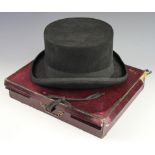 A felt top hat by P. J. Powell, size L, 16.25 x 20.