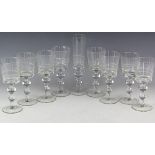 A set of eight baluster stem wine glasses,