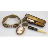 A micro-mosaic bracelet, the five panels set with floral designs in gilt metal,