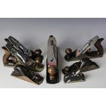 A collection of eight vintage Stanley wood working planes in original boxes, comprising No 5,