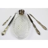 A 19th century cut glass and silver plated hip flask,