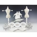 A decorative white porcelain love bird ornament, 32cm high, along with four similar soap dishes,