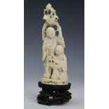 A 19th century Japanese carved ivory okimono,