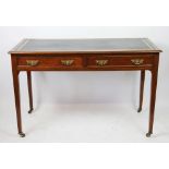 An Edwardian mahogany writing table retailed by Heal & Son,