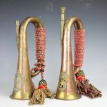 Two copper and brass military bugles, one with a badge for the 23rd Royal Welsh Fusiliers,