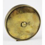 A 19th century brass cased tape measure, the circular case stamped '18 Ft',