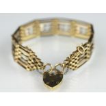 A 9ct yellow gold six bar gate style bracelet,