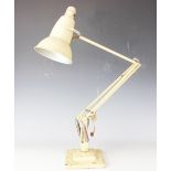 A vintage angle poise lamp, with cast mark for Herbert Terry & Sons Ltd Redditch.