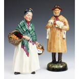 Two Royal Doulton figures, The Orange Lady HN1933 and Lambing Time HN1890,