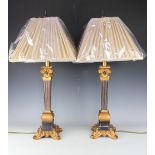 A pair of contemporary table lamps,