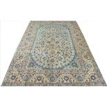 A hand woven wool Persian Kashan carpet,