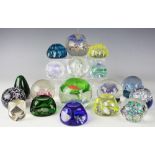 A collection of eighteen assorted paperweights to include four Caithness examples,