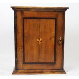 An oak spice cupboard, constructed of 18th century and later timbers,