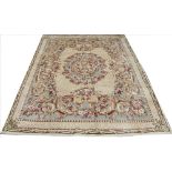 A Chinese hand woven carpet, with floral Aubusson style detailing,