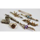 A collection of six assorted bar brooches,