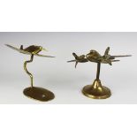 Two brass WWII model aeroplanes; a Spitfire type, 15cm high and a Lacaster 12.