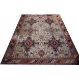 A Caucasian hand woven wool carpet,