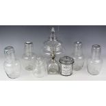 A selection of glassware to include, four bedside carafes and tumbler covers,