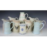 A collection of assorted decorative contemporary jugs, including four pairs,