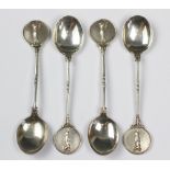 GOLFING INTEREST; A George V set of four silver spoons, 'J & F' Birmingham 1933,