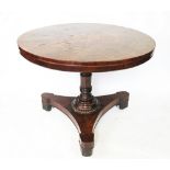 A 19th century inlaid walnut centre table, the radially veneered top with a later centre,