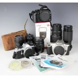 A selection of Canon cameras, lens and others, comprising a Canon EOS 350D, a Canon EOS 300,