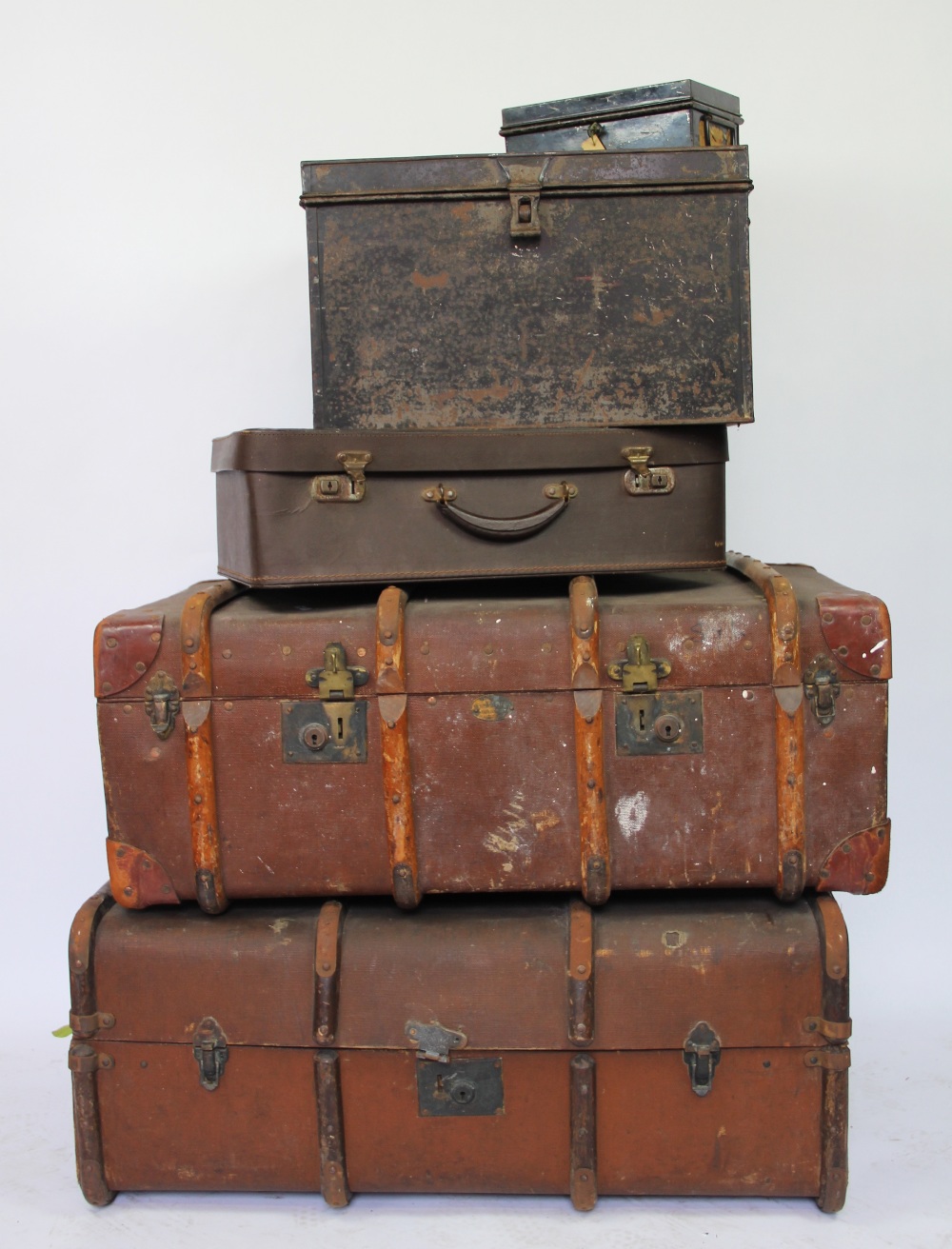 Two vintage travelling trunks, enclosing various boxes and cases,