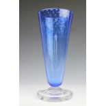 A Keith Murray for Stevens and Williams blue glass vase with bubble detailing,