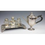 An old Sheffield plate desk stand, with a central chamber stick flanked by two inkwells,