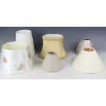 Seven assorted small sized lamp shades to include pleated,