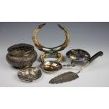 A selection of eastern white metal items comprising;