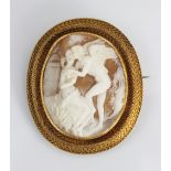 A carved shell cameo brooch,