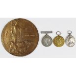 A World War One medal group of three and death plaque, the BWM and VM to 7865 Pte G, Pulley Bedf R.