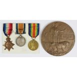 A World War One British Expeditionary Force trio and death plaque to C3 / 2190 A.E.E.H. Rudd, A.B.