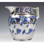 A pearlware silver lustre and cobalt jug, decorated with scrolling vines and grapes,
