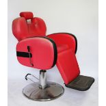 A pair of vintage barbers chairs, of retro design,