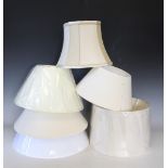 Eleven medium sized assorted lamp shapes, including pleated,