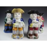 A collection of toby jugs, to include; a Pratt ware toby,