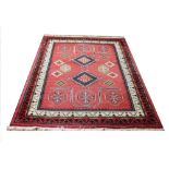 A Persian wool carpet,