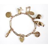 A 9ct yellow gold charm bracelet,