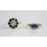 A three stone sapphire and diamond ring,